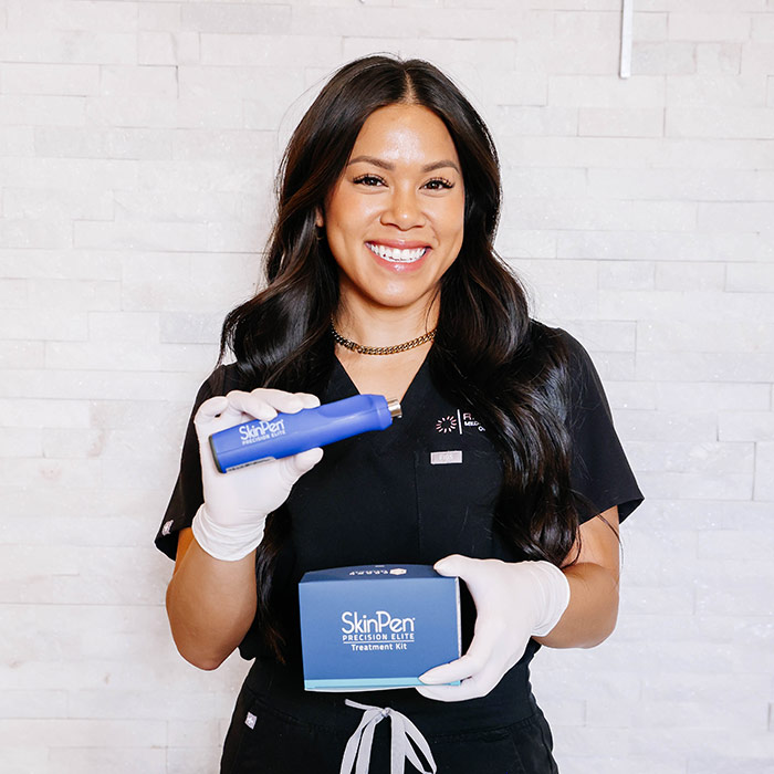 a woman holding SkinPen