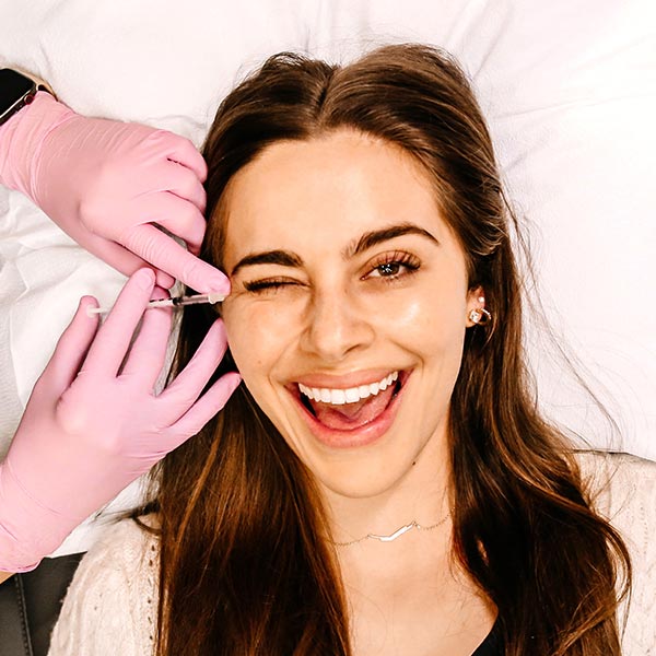 woman getting eye injection