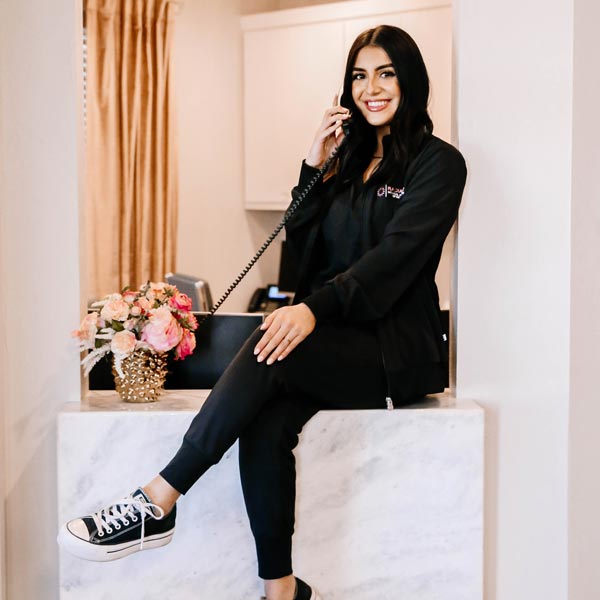 Women on Phone at Radiance Medical Aesthetics of Oklahoma